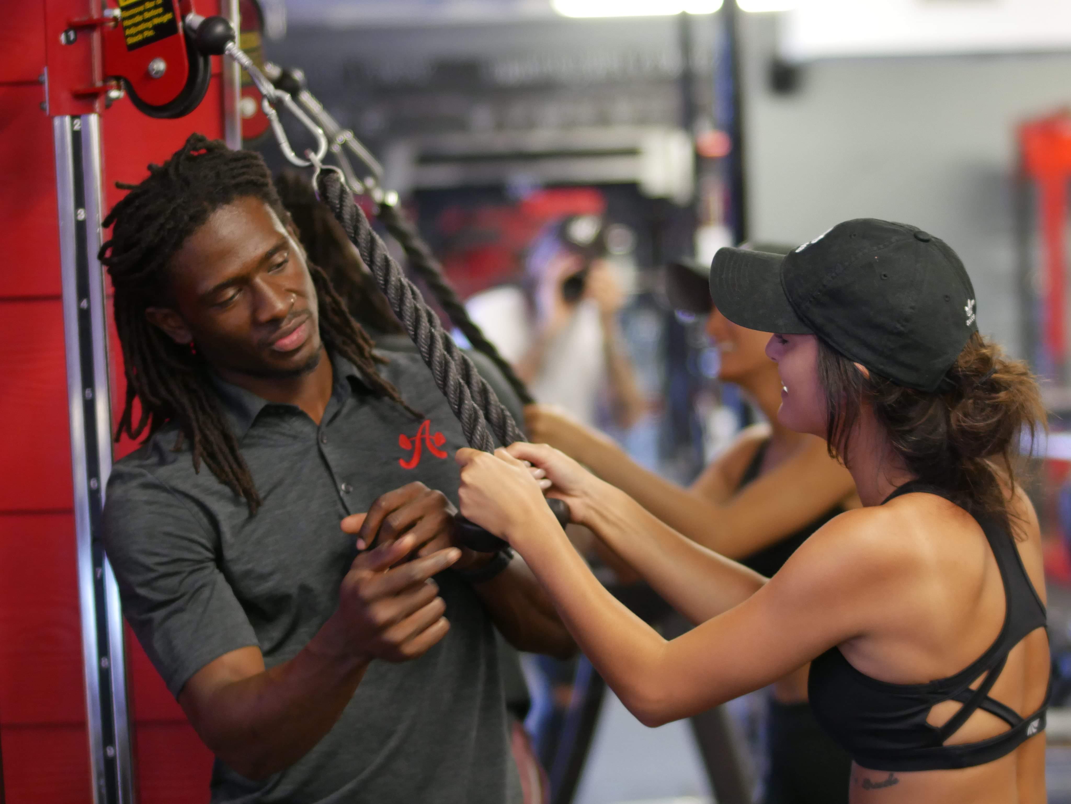 Certified personal trainer, Darryl Payne, with an Austin Simply Fit client