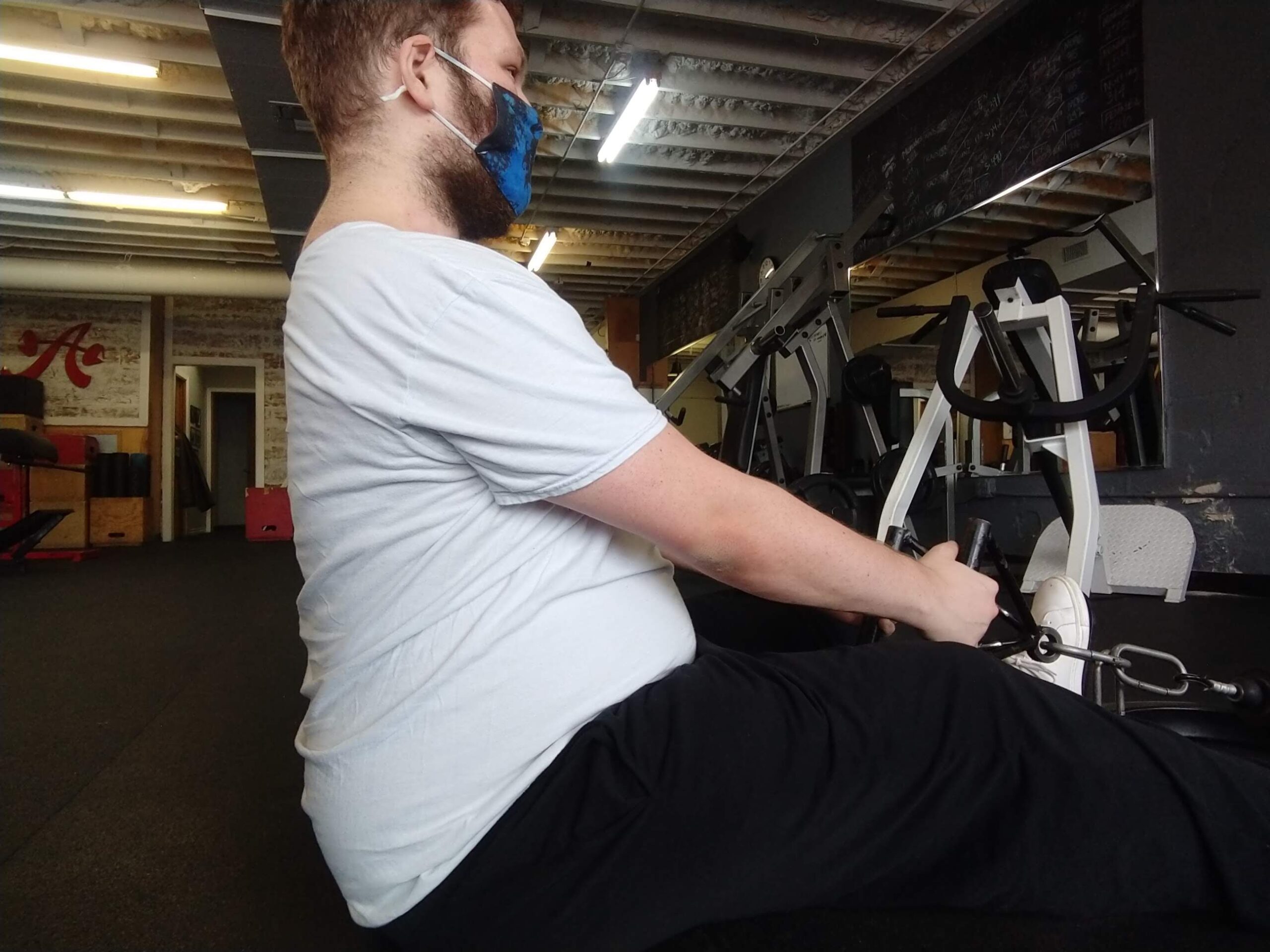 Client doing seated row