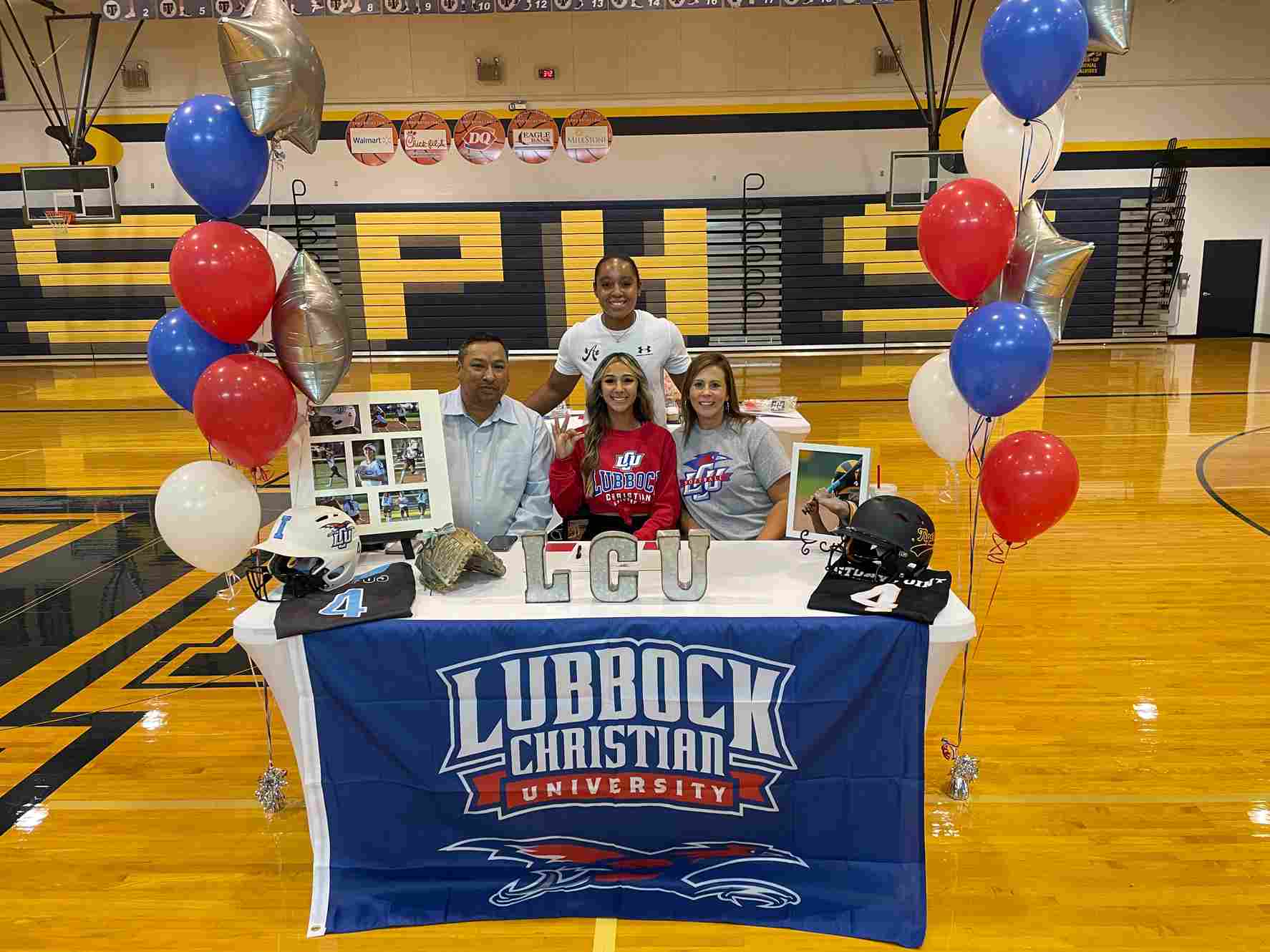 Coach Sierra at Alyssa Campos signing with Lubbock Christian