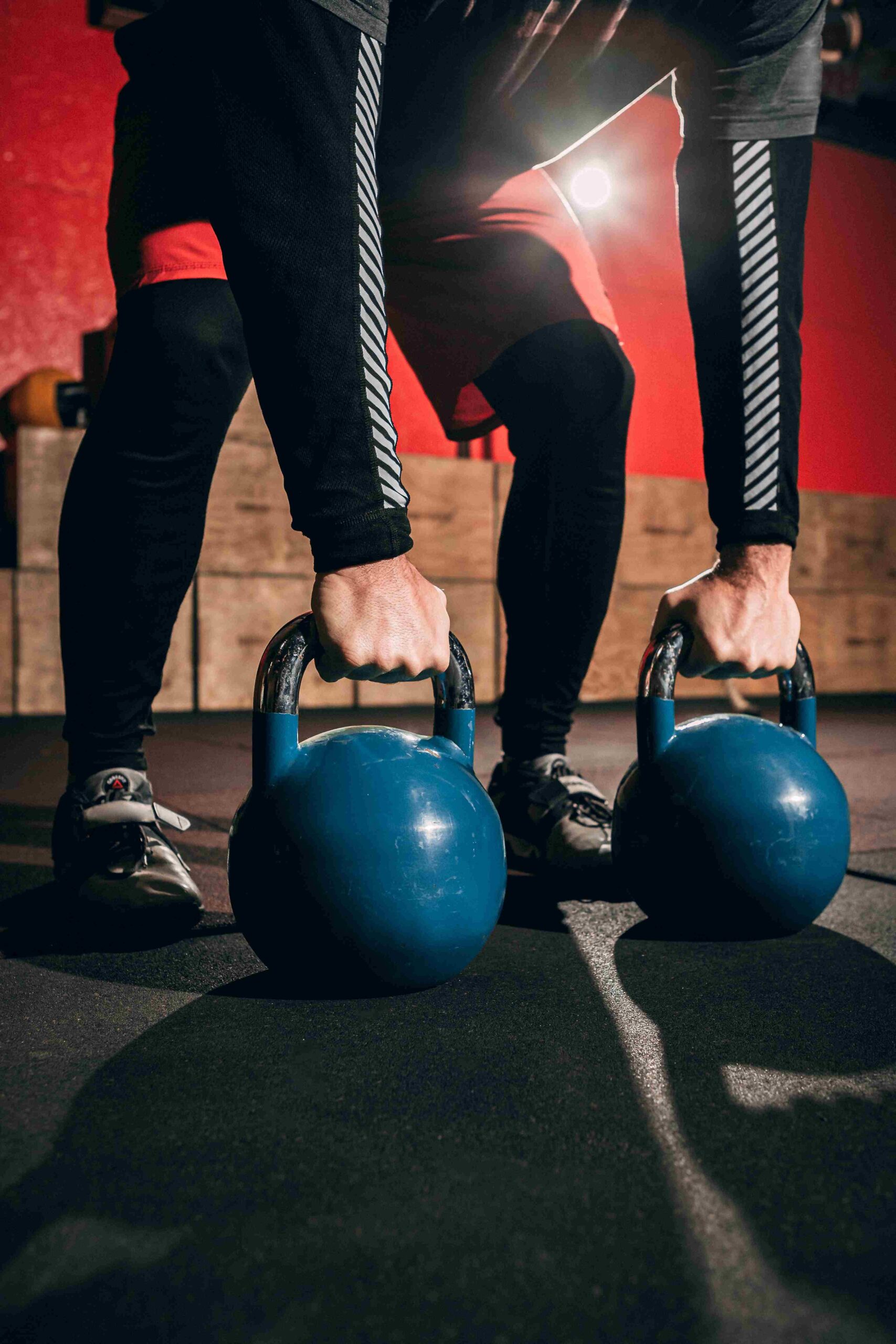 Man with two kettlebells