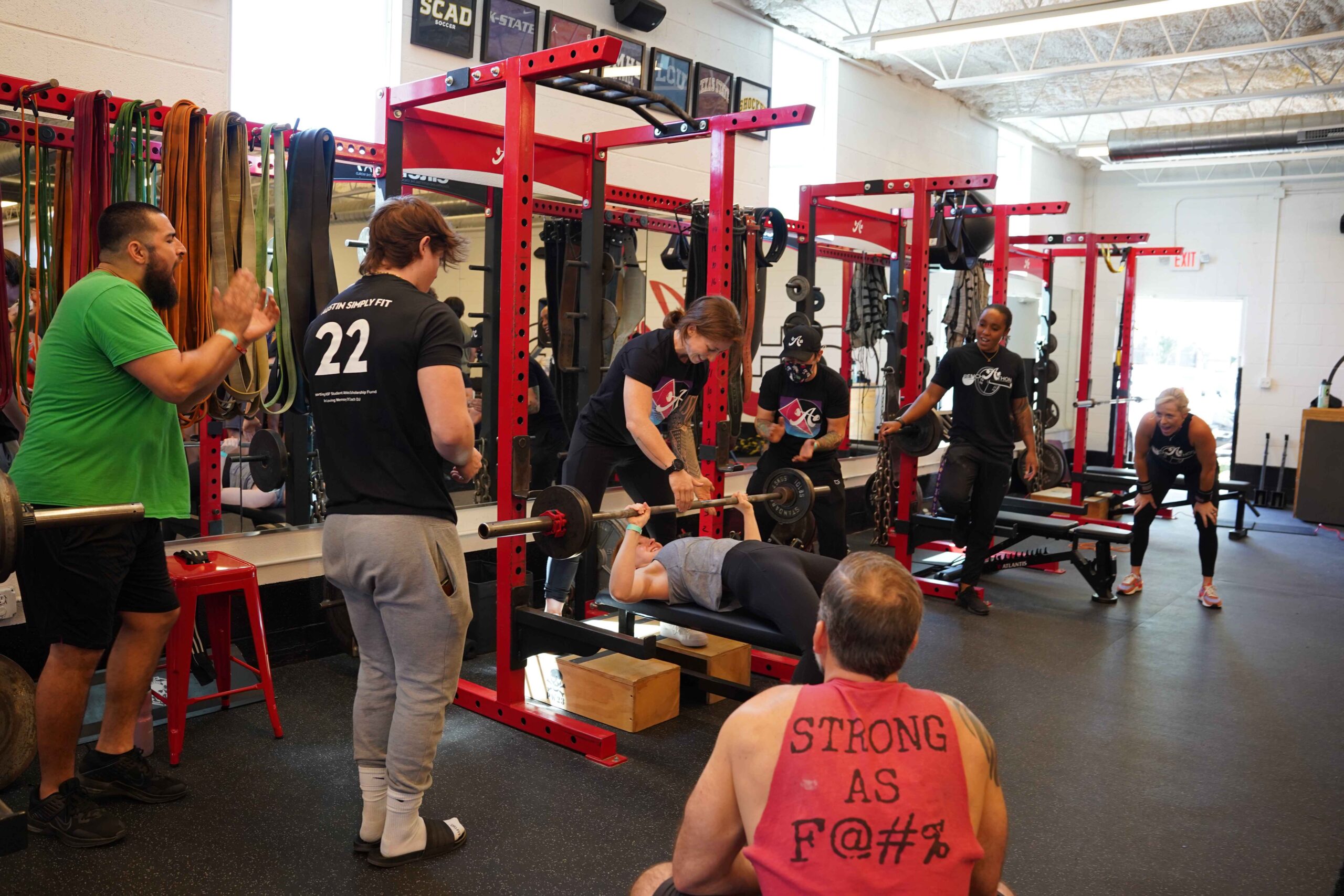 A lifter performing a bench press at Bench-A-Thon