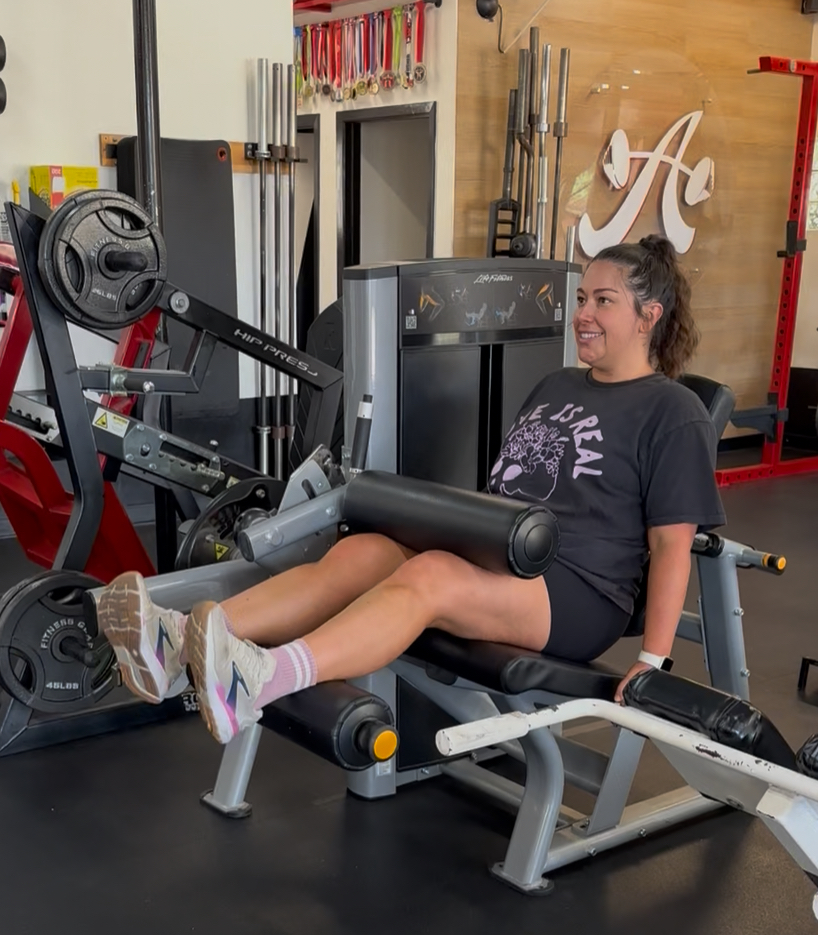 Client Highlight Megan doing seated hamstring curls