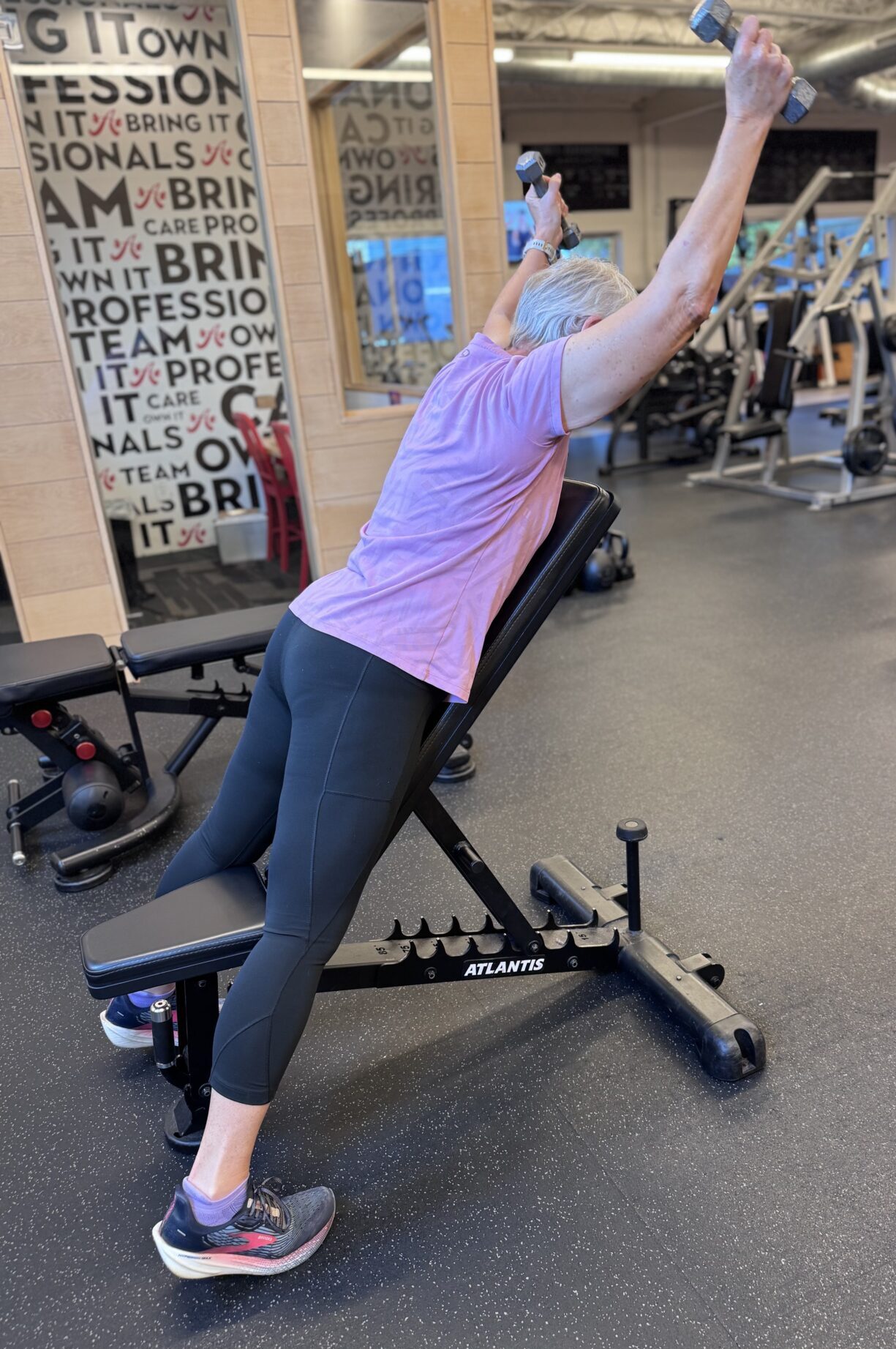 Client Highlight Laurie doing a Trap 3 dumbbell raise
