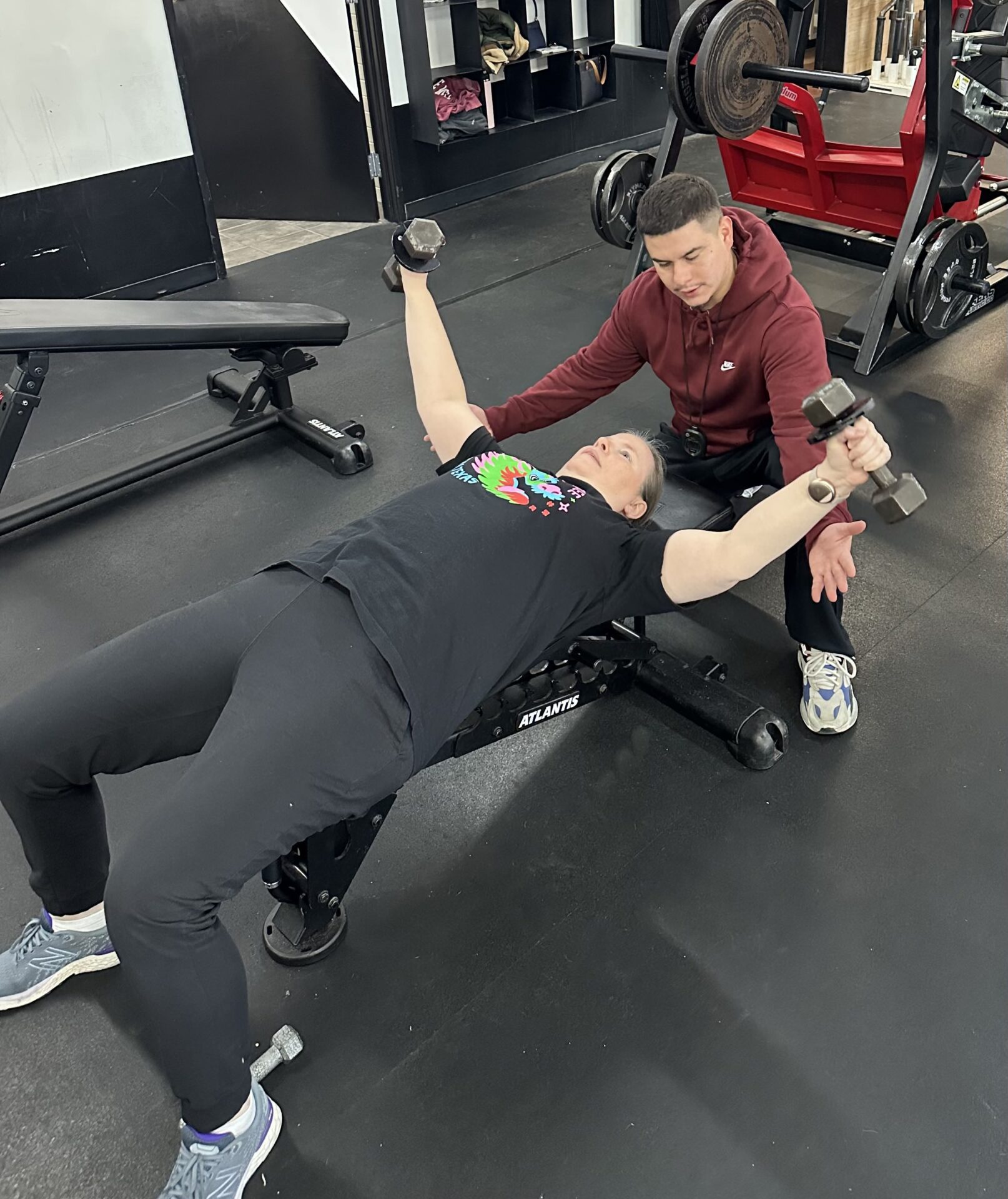 client highlight Shannon doing a dumbbell pec flye