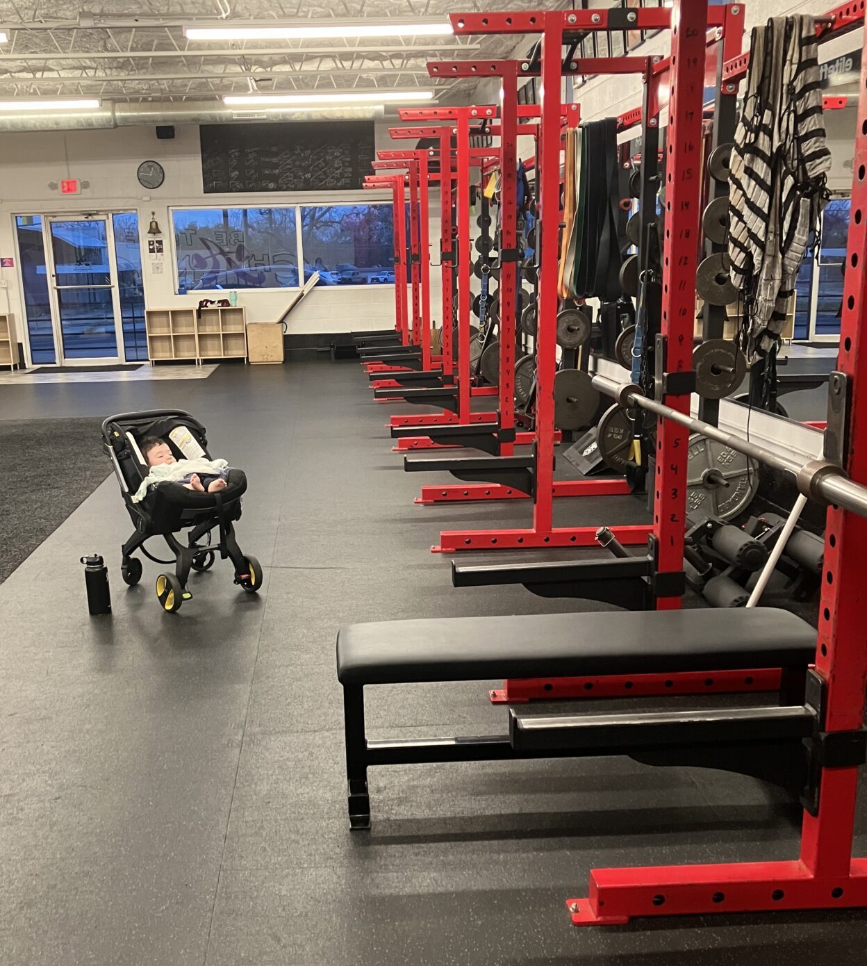 Baby Max in front of the racks at Austin Simply Fit