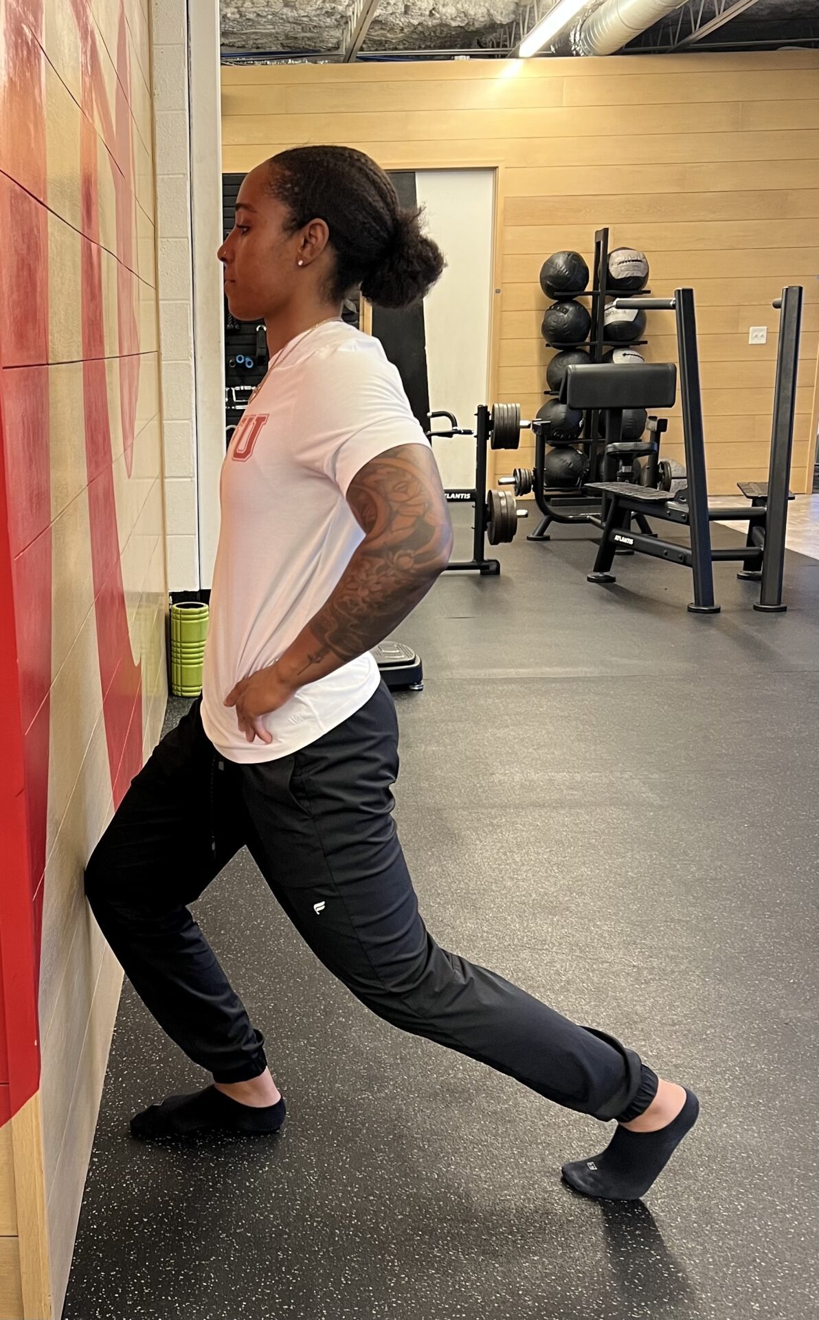 Sierra doing an ankle dorsiflexion test movement